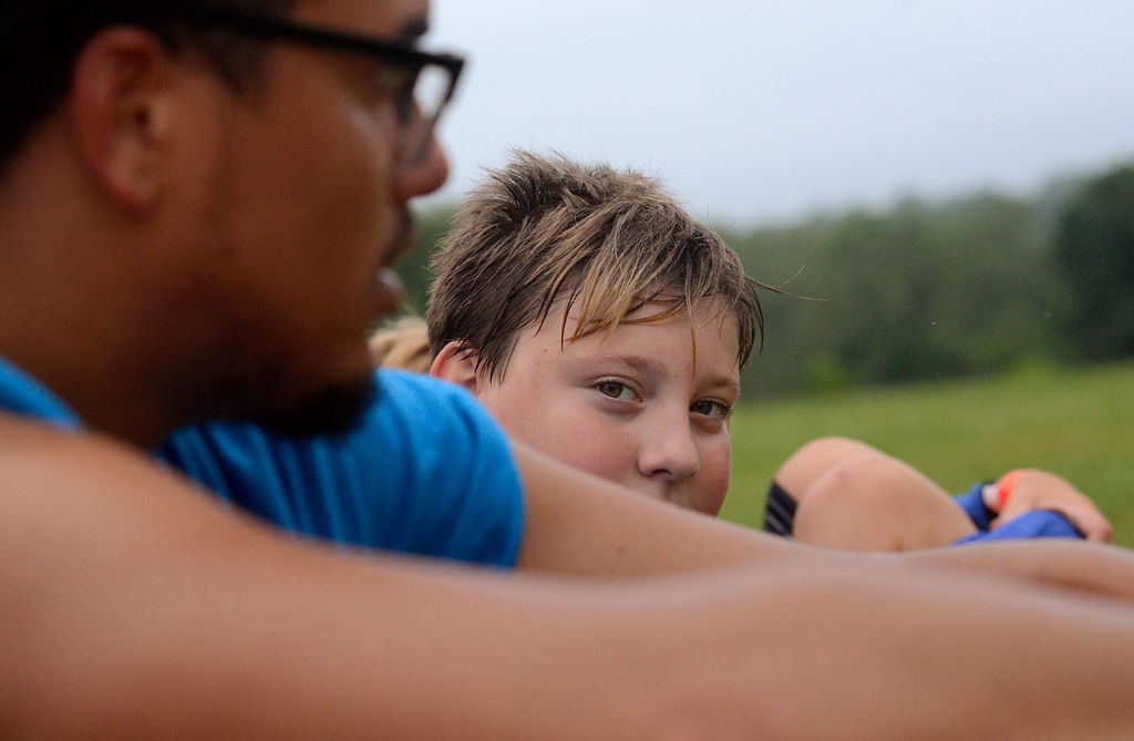 Cooper Brothers, 11, rests in between rounds of dodgeball